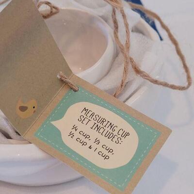 Lot 91: New Easter Napkins, (2) Plates and Bunny Measuring Cups 