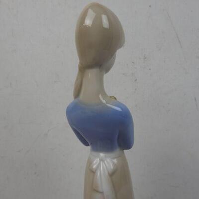 Ceramic Figurine, Woman Holding Container, 11