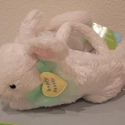 Lot 123: Animated Bunny Basket, Erasers, Stick On Patches, YoYo, (2) Windup Toys and Clip On Soft Plushie 