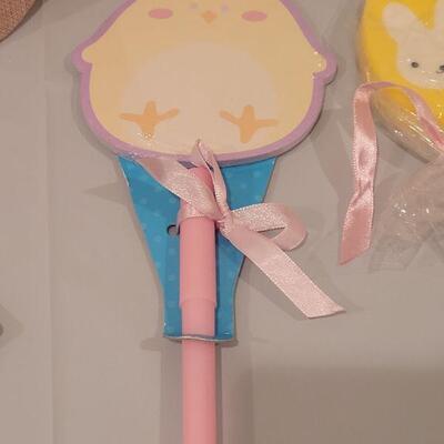 Lot 132: New Easter Purse Basket , Bunny Ears Headband, Coin Purse,  Lollipop Handsoap, Earrings, Memo Pad & Pen, Bath Fizzie and...