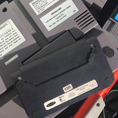 Nintendo original game system NES-001 with 10 games