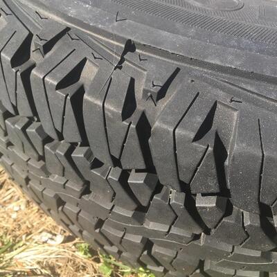 Tire and Hitch Lot with P235/70 R16 mud and snow tubeless radial tire