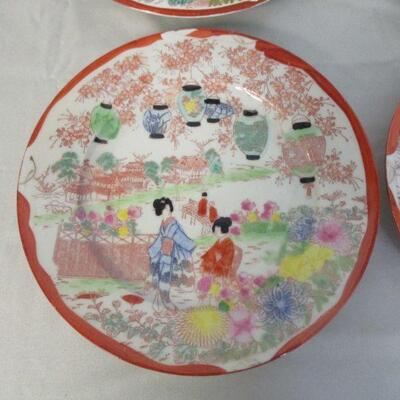 Lot 35 - (4) Asian Themed Plates