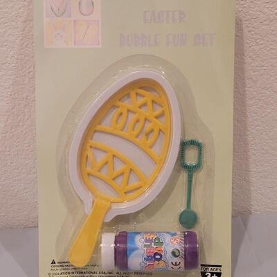 Lot 139: New 'Here Comes Peter Cottontail' DVD, Bubbles and a Bunny Stacking Game