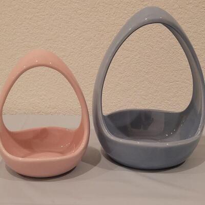 Lot 147: (2) Ceramic Egg  Candy Dishes or Candleholders (Pink 5.5", Blue 8")