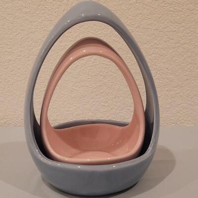 Lot 147: (2) Ceramic Egg  Candy Dishes or Candleholders (Pink 5.5", Blue 8")