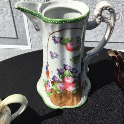 Collection of porcelain and glass with teapots 5 to 8 inches high each