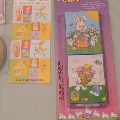 Lot 156: New Easter Bunny Basket with Puzzles, Stickers, Wind Up Toys, Bath Toys, Bunny Book and Faux Rabbits Foot Keychain 