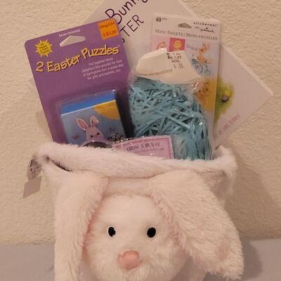 Lot 156: New Easter Bunny Basket with Puzzles, Stickers, Wind Up Toys, Bath Toys, Bunny Book and Faux Rabbits Foot Keychain 