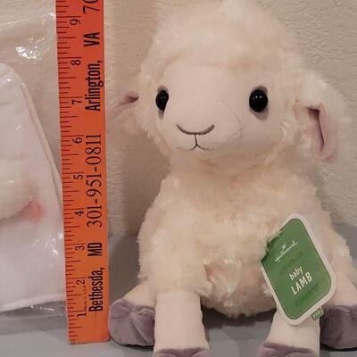Lot 162: New Hallmark Baby Lamb, (2) Wipes Boxes, Airplane Spoon and Carseat Strap Covers 