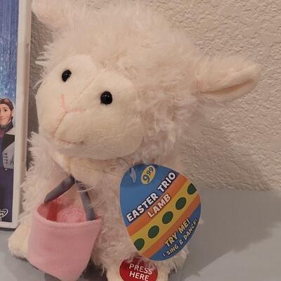 Lot 163: New Disney Frozen DVD,  Princess Book and Activities and a Singing Lamb