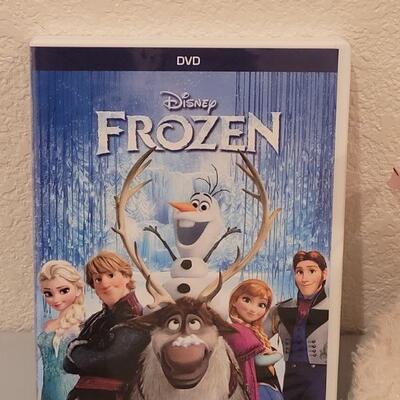 Lot 163: New Disney Frozen DVD,  Princess Book and Activities and a Singing Lamb