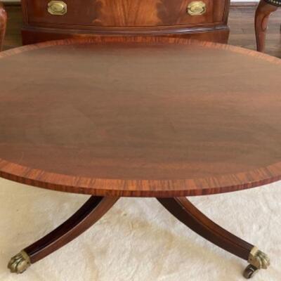 Baker Oval Mahogany Coffee Table with Hairy Claw Feet and Inlaid banding 