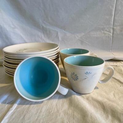 White and blue cup and plate set