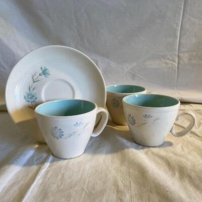 White and blue cup and plate set