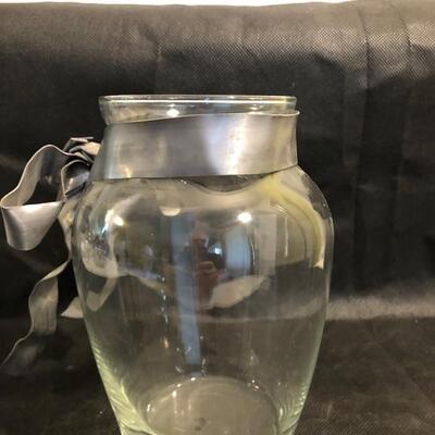 Collection of cut glass vases and one with a bow