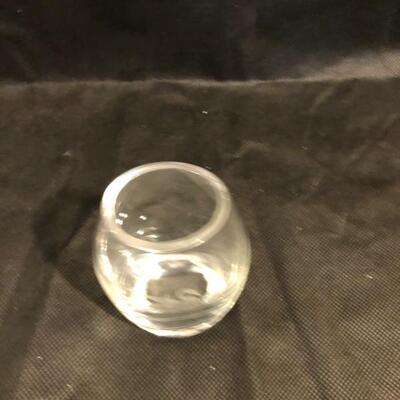 Collection of cut glass vases and one with a bow