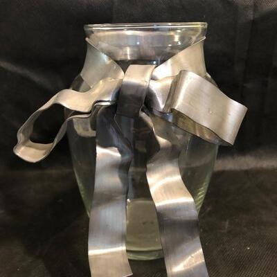 Collection of cut glass vases and one with a bow