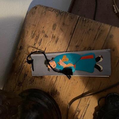 Japanese cloth art depicting an artist paintingÂ 