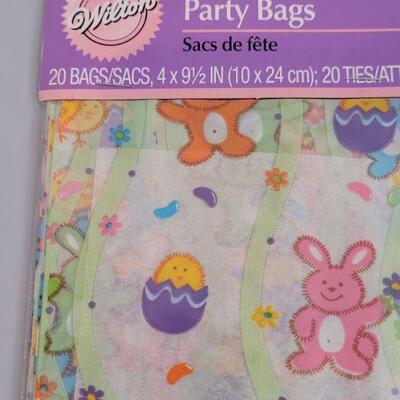 Lot 242: New Disposable Plates and Napkins, Treat Bags, Edible Grass, Window Easter Gels