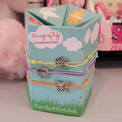 Lot 255: New Easter Basket Fillers- Coin Purse, Lip Balm, Bracelets Nail Art Set, Small Hallmark Snoopy, Wind Up Toys, Pink Basket...