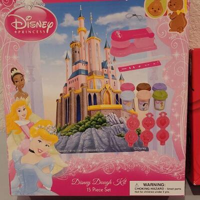 Lot 284: New Dora the Explorer Game, Disney Dough Kit and Douglas Bunny