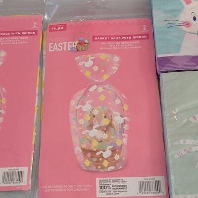 Lot 307: New Disposable Plates Napkins, Serving Tray, Plastic Cups and Easter Basket Wrap