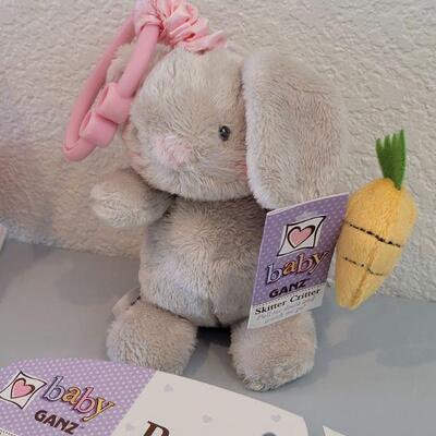 Lot 319: New (12m) Long Sleeve Onsie, Bibs, Easter Piglet and Baby Ganz Skitter Critter Bunny 