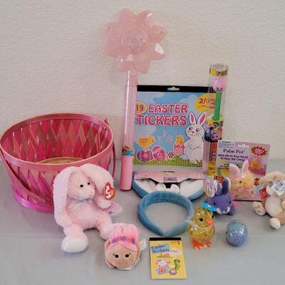 Lot 322: New Easter Basket including Chick Palm Pet,Ty Beanie Bunny, Hallmark Mirth Mermaid Slap Bracelet, Light Up Wand, Pez, Bunny Ears...