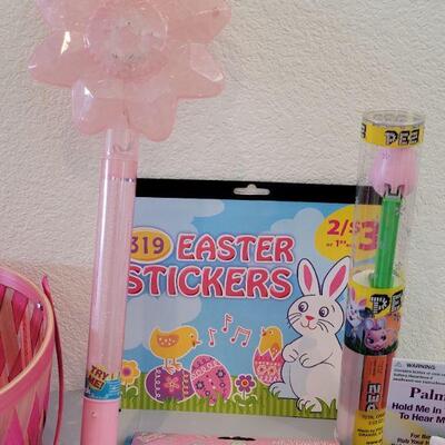 Lot 322: New Easter Basket including Chick Palm Pet,Ty Beanie Bunny, Hallmark Mirth Mermaid Slap Bracelet, Light Up Wand, Pez, Bunny Ears...