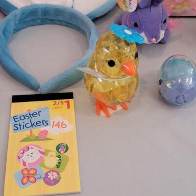 Lot 322: New Easter Basket including Chick Palm Pet,Ty Beanie Bunny, Hallmark Mirth Mermaid Slap Bracelet, Light Up Wand, Pez, Bunny Ears...