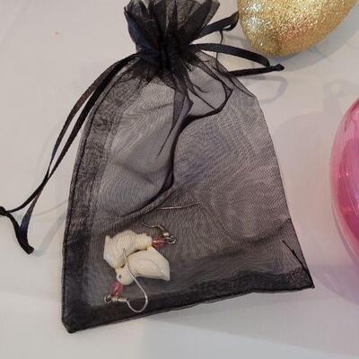 Lot 344: New Hallmark  Bunny Purse Bag with Duck Earrings, Lip Balm, Bunny Coin Purse, Gold Egg with Scarf & 2 Squishmallows