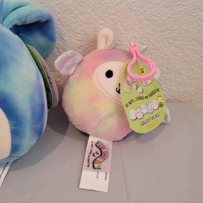 Lot 344: New Hallmark  Bunny Purse Bag with Duck Earrings, Lip Balm, Bunny Coin Purse, Gold Egg with Scarf & 2 Squishmallows