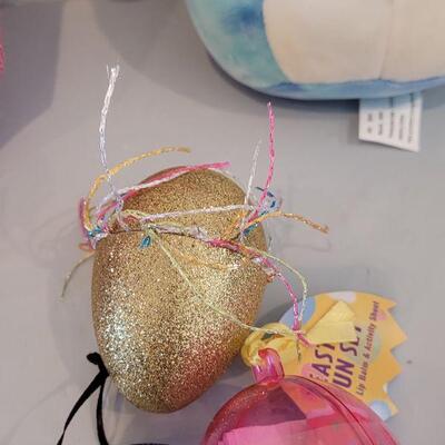 Lot 344: New Hallmark  Bunny Purse Bag with Duck Earrings, Lip Balm, Bunny Coin Purse, Gold Egg with Scarf & 2 Squishmallows