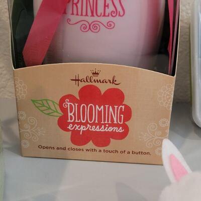 Lot 355: New Hallmark Easter Bucket with a Snoopy Bunny,  Bloom Again and Again Flower, Miracle Melting Bunny, Chirping Chicks and Stick...