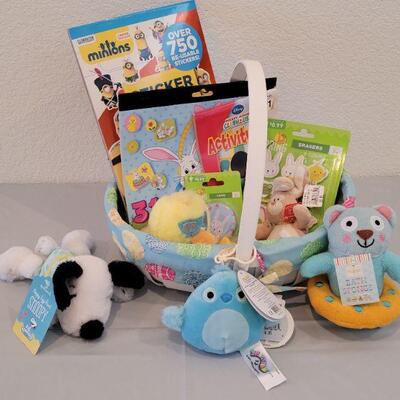 Lot 359: New Hallmark Easter Basket with Activities, Snoopy Bunny, Squishmallow Clip On, Bath Sponge, Zip a long Duck and Bunny