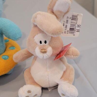 Lot 359: New Hallmark Easter Basket with Activities, Snoopy Bunny, Squishmallow Clip On, Bath Sponge, Zip a long Duck and Bunny