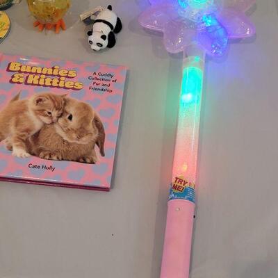 Lot 364: New Bunny with Easter Basket, Jump Rope, Chalkboard Placemat, Book, Light Up Wand, Lip Gloss Disney Princess Rings, Bubbles and...