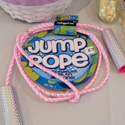 Lot 364: New Bunny with Easter Basket, Jump Rope, Chalkboard Placemat, Book, Light Up Wand, Lip Gloss Disney Princess Rings, Bubbles and...
