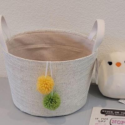 Lot 367: New Hallmark Easter Bucket with Stick On Patches, Scarf, Lip Balm, Squishmallow and Little Blessings Charm 