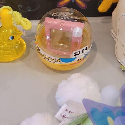 Lot 370: New Peeps Easter Bucket, Chalkboard Placemat, Activity Pad, YoYo, Sculpt n Soap, Bubbles, Flutterfly Snoopy and Hallmark Knit Bunny