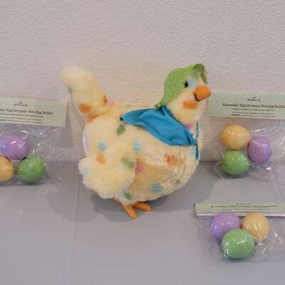Lot 374: Hallmark Egg Dropping Hen with Extra Eggs