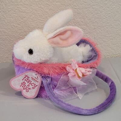 Lot 375: New Dora the Explorer Magnet Book and Pinkalicious Activities Book and a Plush Bunny in a Purse