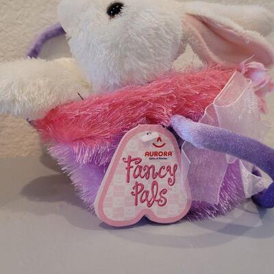 Lot 377: Animated Chick and Plush Bunny in a Purse 