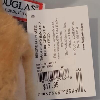 Lot 379: New Peeps Easter Bucket with Precious Moments Prayer Bear, Douglas Rabbit, Activity Pads, Slinky,  Sculpt n Soap &...