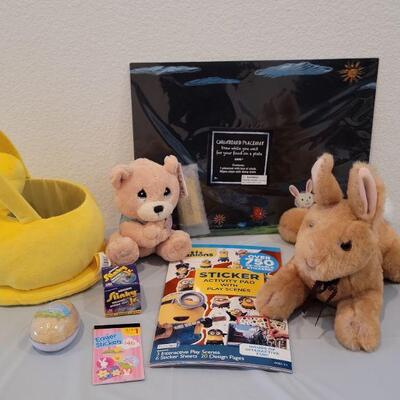 Lot 379: New Peeps Easter Bucket with Precious Moments Prayer Bear, Douglas Rabbit, Activity Pads, Slinky,  Sculpt n Soap &...