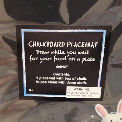 Lot 385: New Peter Rabbit Nursery Songs Book, Chalkboard Placemat and Hallmark Animated Bunny 