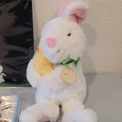 Lot 385: New Peter Rabbit Nursery Songs Book, Chalkboard Placemat and Hallmark Animated Bunny 