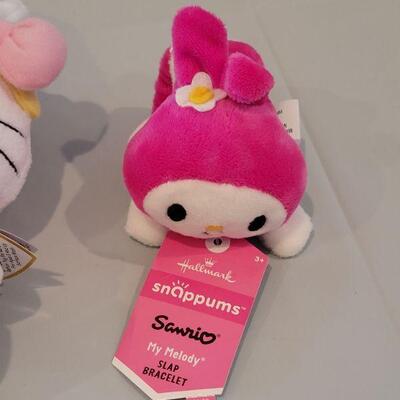 Lot 386: New Easter Basket with Dress Up Butterfly Wings, HELLO KITTY Slap Bracelet & Ty Beanie Baby Glitter Craft, Pop On Nails,...