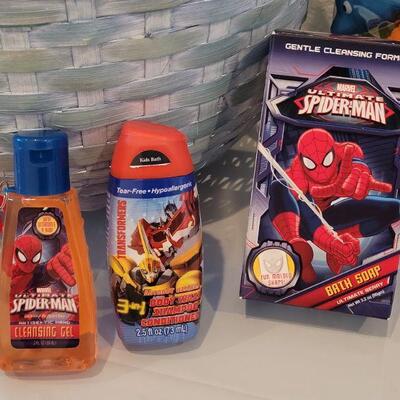 Lot 387: New Easter Basket with Ganz Bunny, Bath Toys, Spider-Man Bath Soap-Shampoo-Cleansing Gel, Pez, Activity Pad